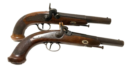 A pair of mid 19th century European percussion cap travelling pistols